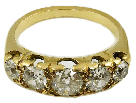 An antique gold and graduated five stone old mine cut diamond set half hoop ring